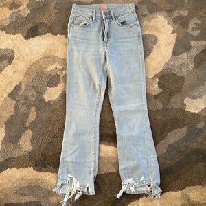 Cropped light wash distressed jeans